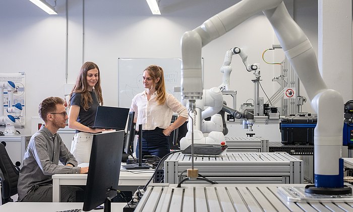 Researchers in one of TUM's robotics labs