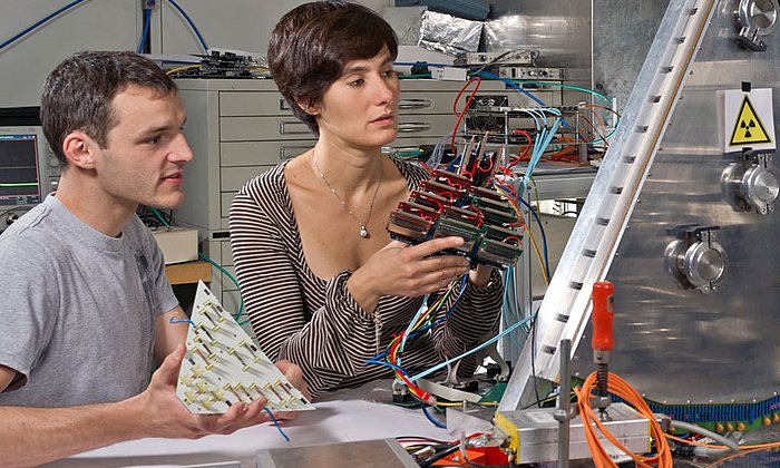 Physicists discussing research