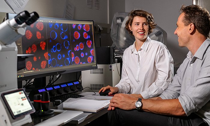 Christine Kriebisch and Professor Job Boekhoven in their lab. 