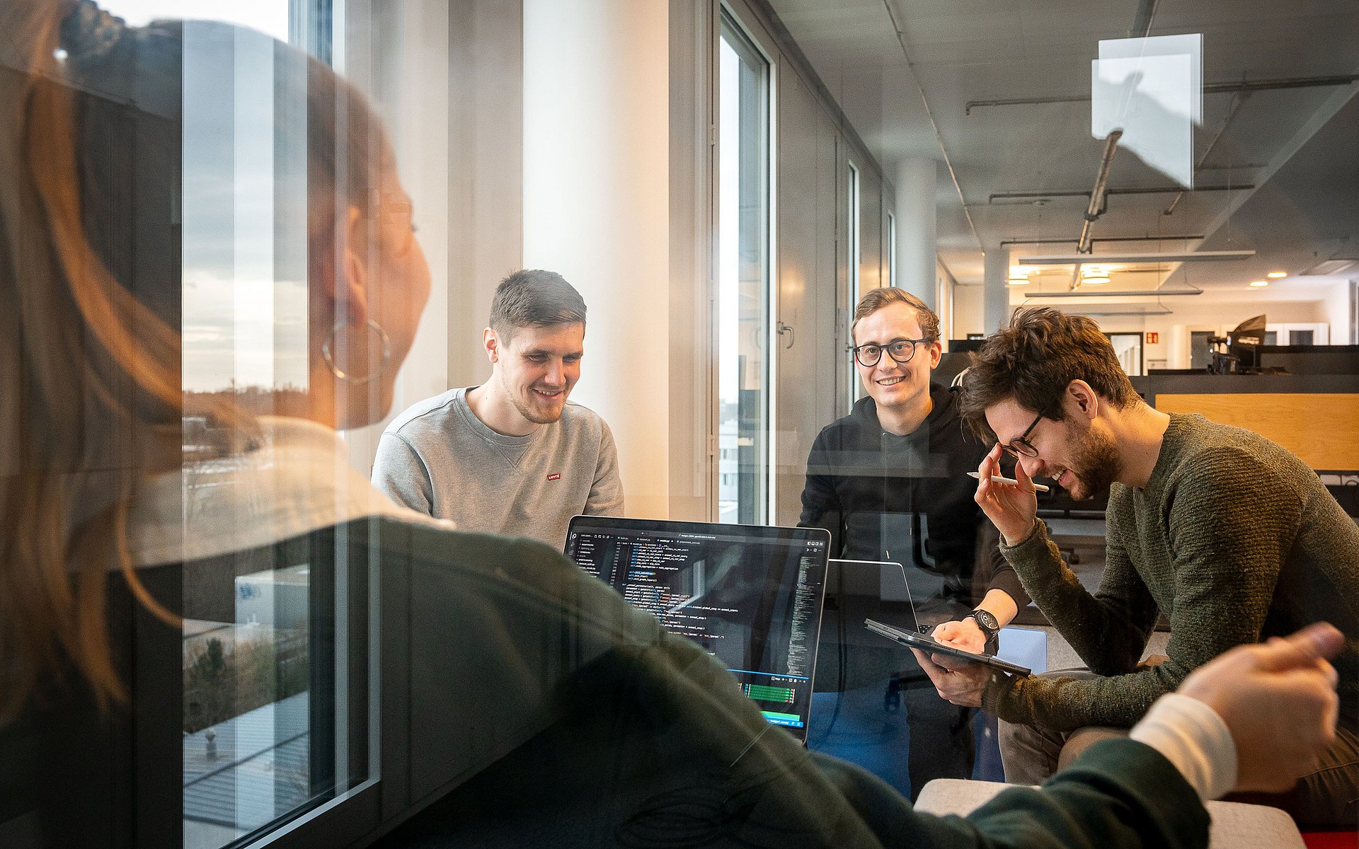 Researchers with computers.