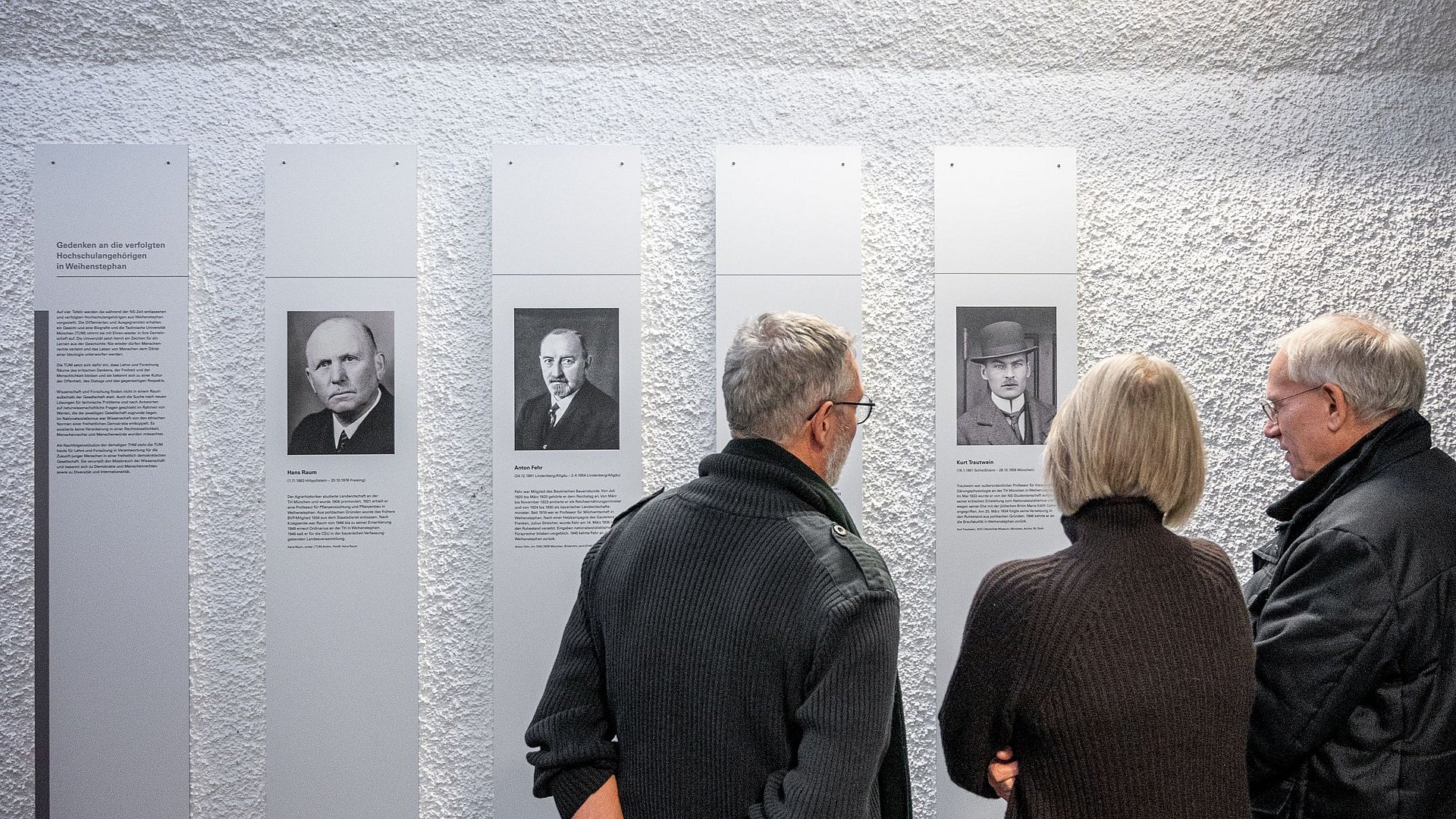 Guests of the opening viewing the information panels