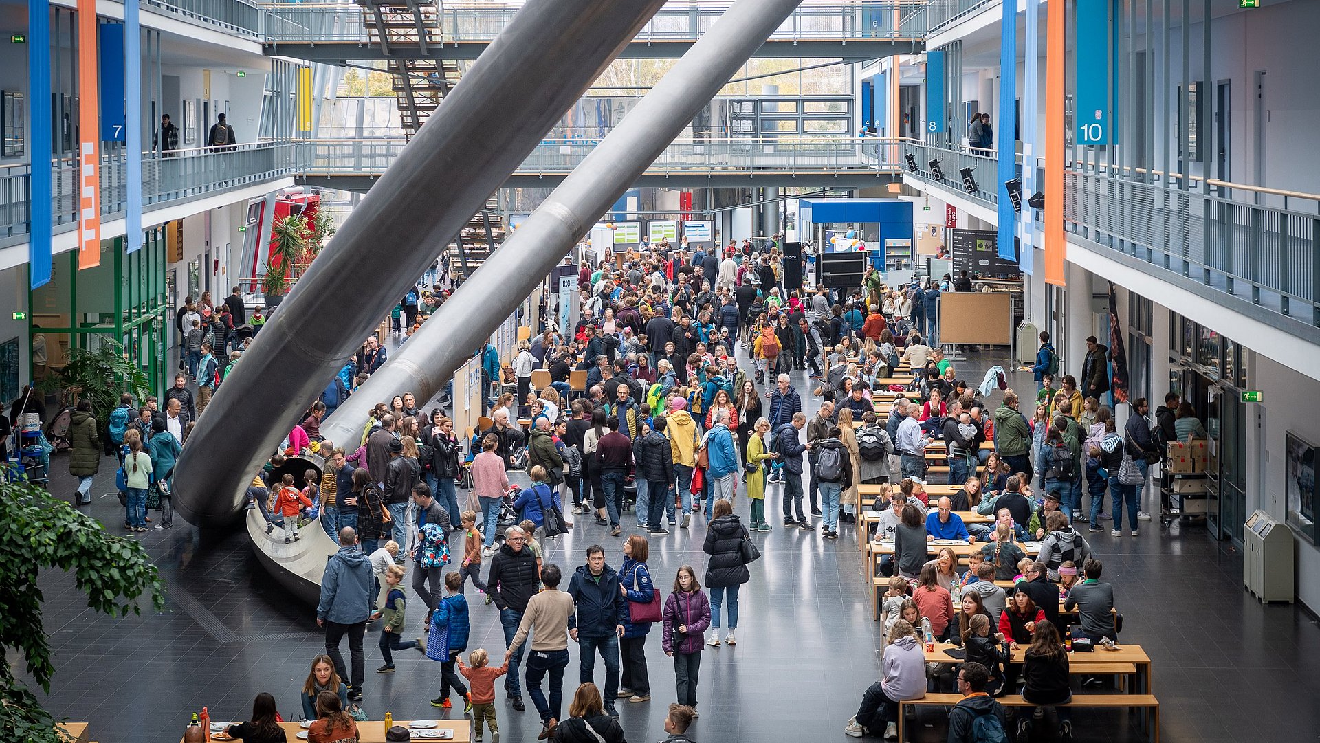 Large crowds at the booths of the Mathematics and Informatics Building.